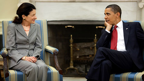 Obama stares at his guest in the Oval Office